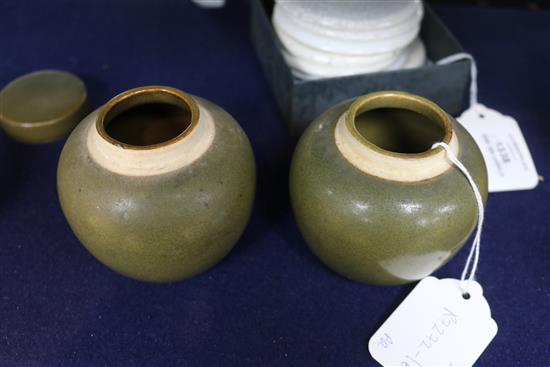 A pair of Chinese teadust glazed small jars and covers, early 20th century, 8cm high